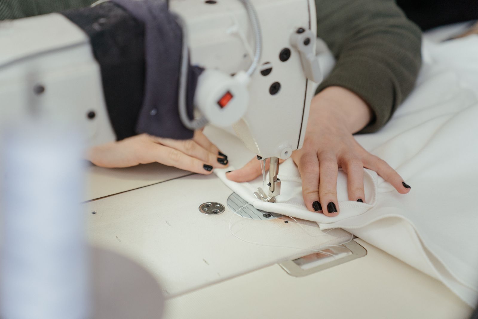 Fabric shaping during tailoring at Koko Atelier, Galway